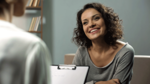 Woman smiles while starting mental health treatment near Edmonds, WA