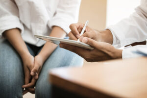 Hands of people in a session of psychiatry in Seattle