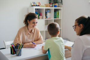 People in a child therapy session